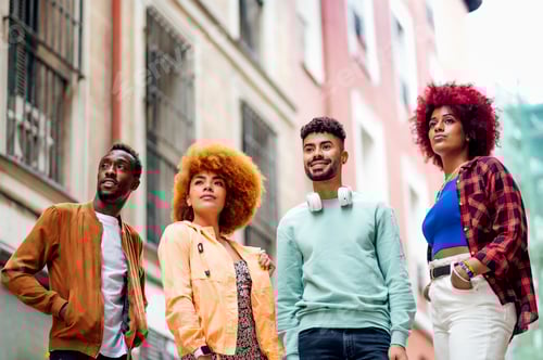 Preview: Four young modern men look into the distance together - freestyle concept