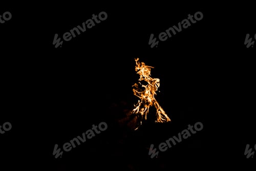Preview: orange flame in bonfire isolated on black