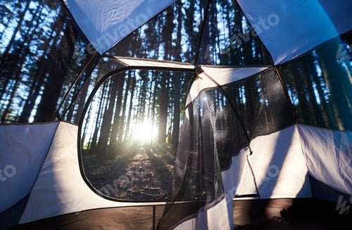 Preview: Tourist tent at campsite in the mountains. Summer camping