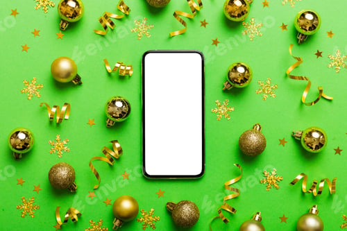Preview: Christmas online shopping from home phone with blank white display top view. smart