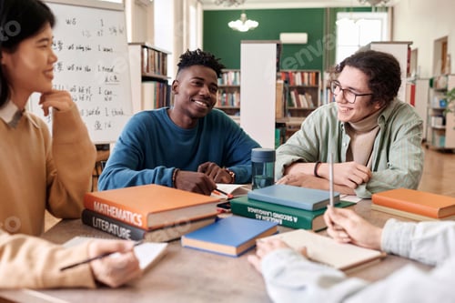 Preview: Multiethnic Group of Students in Library
