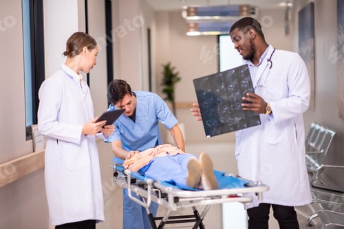 Preview: medics and patient on hospital gurney at emergency