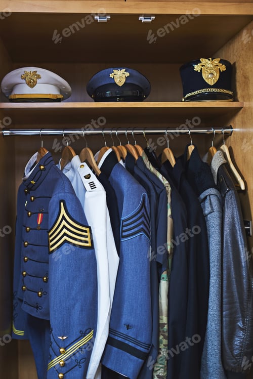 Preview: Military Uniforms and Hats in a Closet
