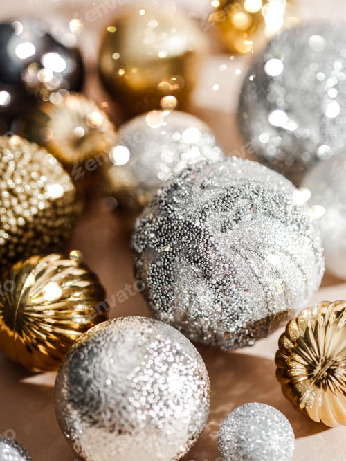 Preview: Different Christmas balls background. Gold and silver balls on beige background
