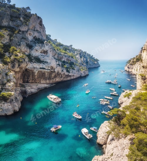 Preview: France. Aerial view of luxury floating boat on transparent turquoise water at sunny day.