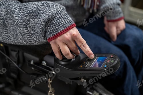 Preview: Close up of man with cerebral palsy sitting on wheelchair