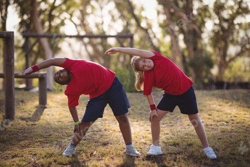 Preview: Kids performing stretching exercise during obstacle course