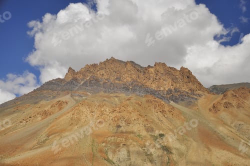 Preview: Brown rocky mountain with cloudy sky on the way of Darcha-Padum road, Ladakh, INDIA