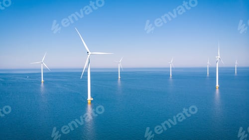 Preview: offshore windmill park with clouds and a blue sky