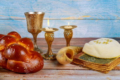 Preview: Shabbat challah bread, shabbat wine and candles on the table