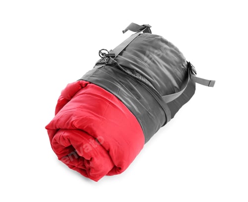 Preview: Rolled sleeping bag on white background. Camping equipment