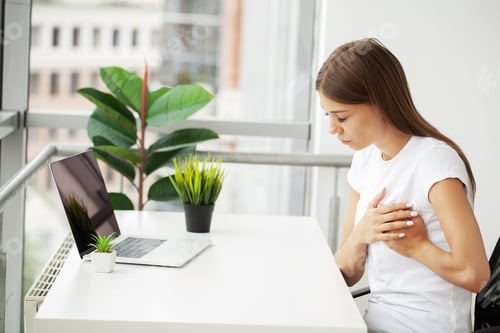 Preview: Health problems, beautiful woman suffering from heart pain.