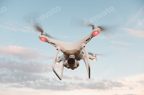 Preview: White drone hovering in a bright blue sky
