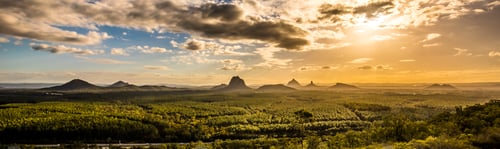 Preview: Panoramic view of Glass House Mountains at sunset visible from W