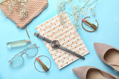 Preview: Flat lay composition with cosmetics and stylish accessories on color background
