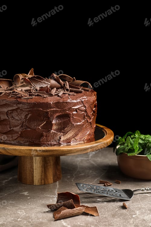 Preview: Composition with tasty homemade chocolate cake on table