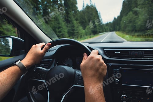 Preview: man hands on steering wheel