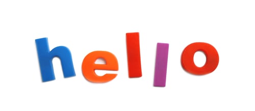Preview: Word HELLO of magnetic letters on white background, top view