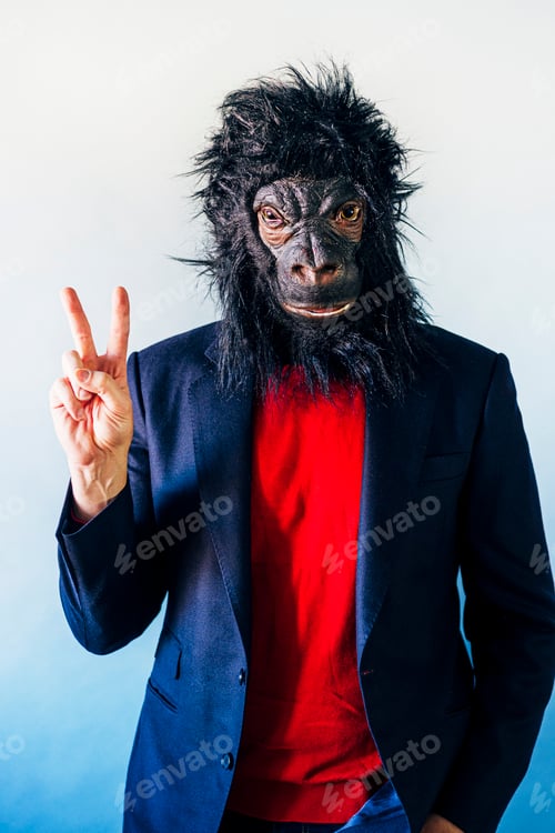 Preview: Man in a suit and with a gorilla mask.