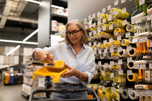 Preview: Shopping for home improvement supplies on a weekend in a modern retail store with organized aisles