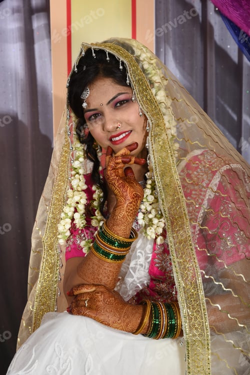 Preview: Indian bride wearing traditional wedding cloths in marriage ceremony.