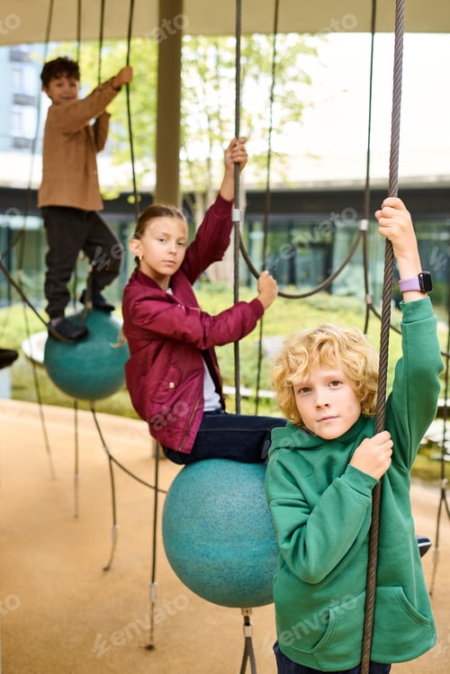 Preview: Joyful autumn moments with children playing on a creative playground structure