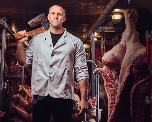 Preview: A butcher in a meat factory.