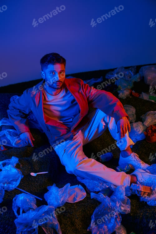 Preview: A Man Amidst Plastic: A Nighttime Reflection