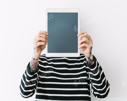 Preview: Woman showing a tablet