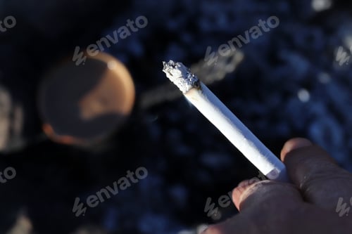 Preview: Turkish coffee on embers and a cigarette in the man's hand