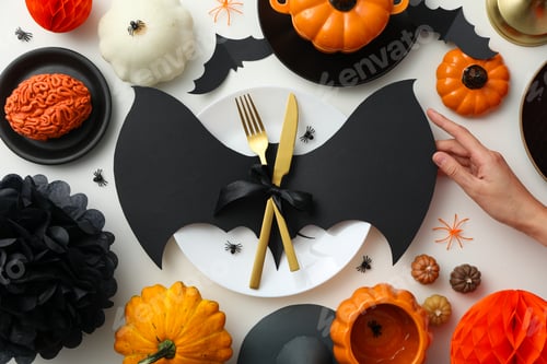 Preview: Table setting for Halloween, spooky decorations with pumpkins and bats