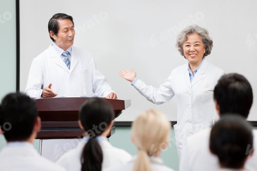 Preview: Medical workers giving speech in boardroom