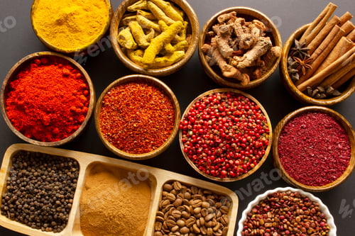 Preview: various spices on black background