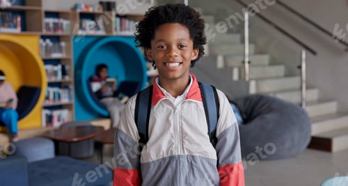 Preview: Portrait, boy and smile with backpack, library and happy for education in academy and joy for learn
