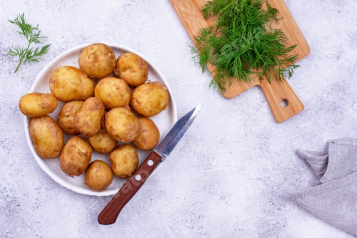 Preview: Young uncooked fresh potato and dill