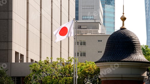 Preview: Japanese flag in city. Tower with Japan banner blowing soft silk