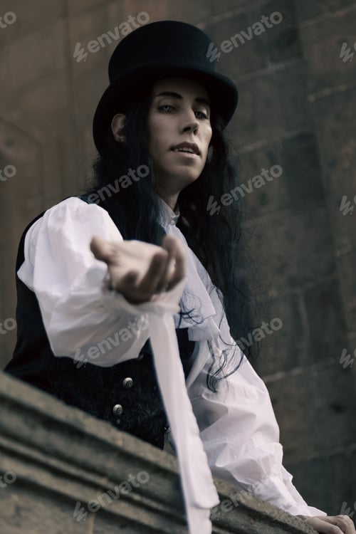 Preview: Vampire with long black hair hypnotizing with his gaze from his castle.