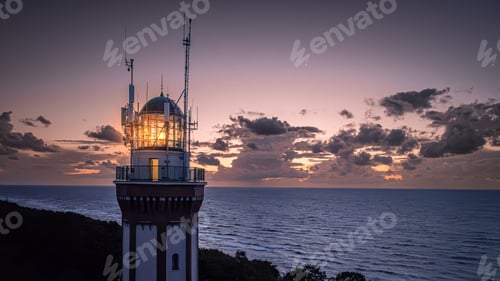 Preview: Light beam from lighthouse by Baltic Sea.