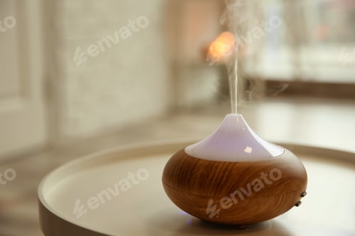 Preview: Aroma oil diffuser on table indoors
