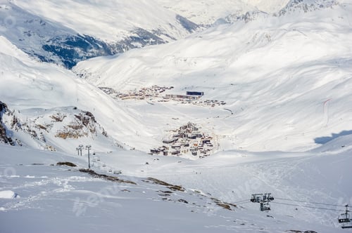 Preview: Alpine winter mountain landscape. French Alps with snow.