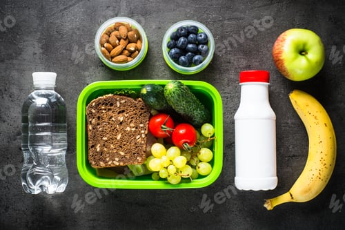 Preview: Lunch box with sandwich, fruit, vegetables, water
