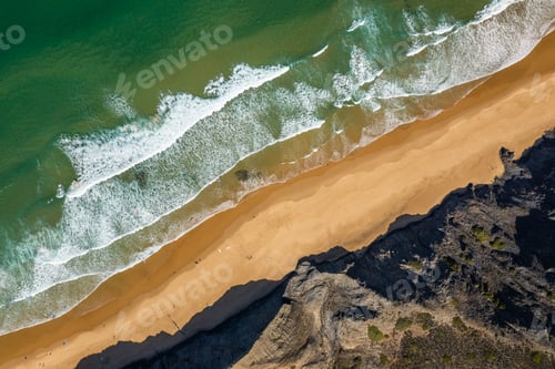 Preview: Aerial drone view of Cordoama Beach in Portugal with sandy shore, cliffs and ocean