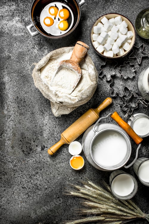 Preview: Baking background. Milk, flour and other ingredients for the dough.