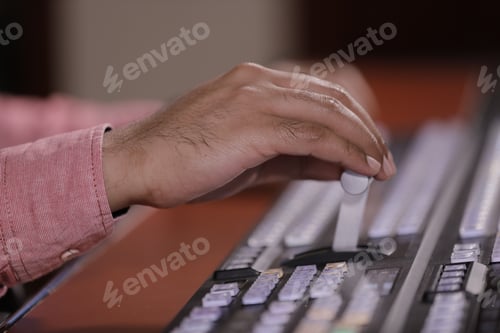 Preview: Hand operating video production switcher, television, audio visual, av, buttons