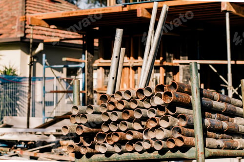 Preview: Construction work. House construction in progress . Metal pipes