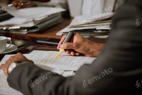 Preview: Hand of experienced male lawyer