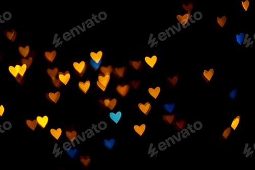 Preview: Valentine grunge heart shaped lights background. Yellow gold and blue heart on black background