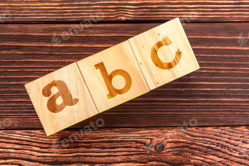 Preview: wooden block alphabet lay on wooden floor