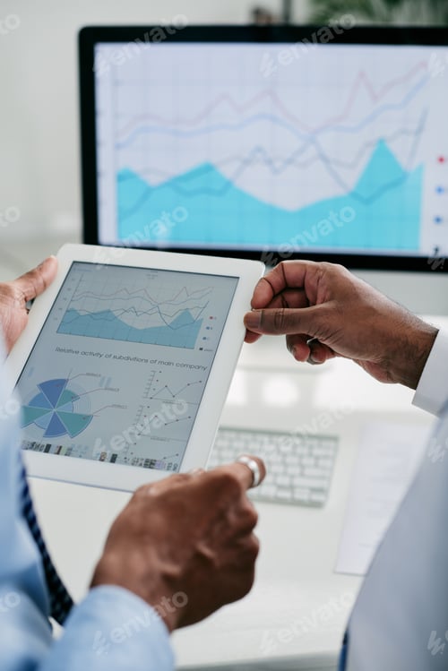 Preview: Entrepreneurs discussing financial chart