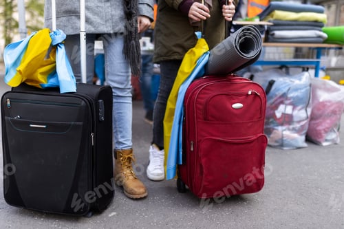 Preview: Lowsection of Ukrainian immigrants with luggage crossing border and getting to refugee camp
